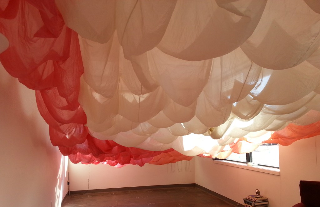 falling up installation art made of silk by abbie powers